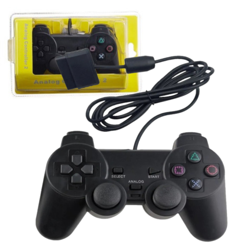 Un mando con cable JOYTICK PS2 negro con dos sticks analógicos, un pad direccional y botones de acción de colores. Se muestra suelto y en una caja amarilla con la etiqueta "Analog Controller 2".