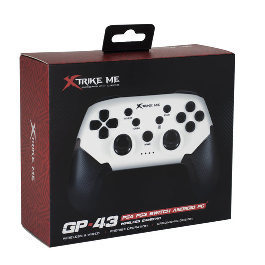 Una caja de venta al público del JOYSTICK XTRIKE ME PARA PS4/PS3/SWITCH/ANDROID/PC, que muestra un mando inalámbrico en blanco y negro compatible con múltiples plataformas y destaca su diseño ergonómico.
